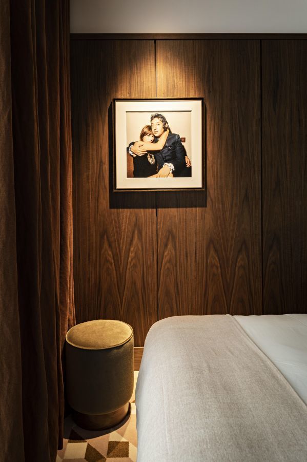 Classic bedroom with iconic portrait of Jane & Serge Gainsbourg